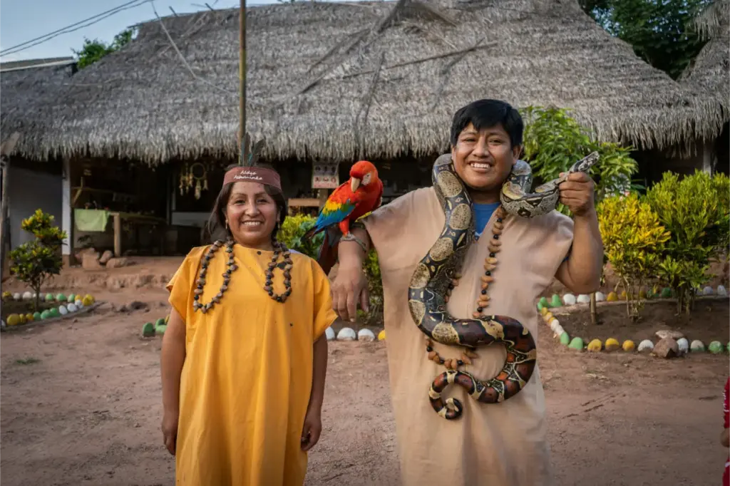 People holding Anaconda Languages of the Peruvian Amazon